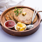 Aloo paratha or gobi paratha also known as Potato or Cauliflower stuffed flatbread dish originating from the Indian subcontinent