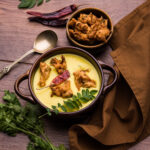 Punjabi Kadhi Pakoda or curry Pakora, Indian cuisine served in a bowl or karahi, selective focus
